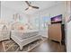 Bright bedroom with a queen-size bed, nightstands, and a dresser at 16317 Gulf Blvd, Redington Beach, FL 33708