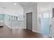 Upper hallway with elevator access and hardwood floors at 16317 Gulf Blvd, Redington Beach, FL 33708