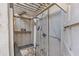 Private outdoor shower with bench and storage at 16317 Gulf Blvd, Redington Beach, FL 33708