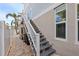 Stairs leading to upper level and storage area at 16317 Gulf Blvd, Redington Beach, FL 33708