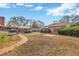 Brick home with pool and guest house at 1702 S Miller Rd, Valrico, FL 33594