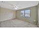 Bedroom with window and ceiling fan at 1702 S Miller Rd, Valrico, FL 33594