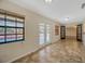 Breakfast nook with French doors leading to a patio and pool at 1702 S Miller Rd, Valrico, FL 33594