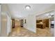 Tiled dining area with view into living room and kitchen at 1702 S Miller Rd, Valrico, FL 33594