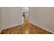 Hardwood floors in a hallway leading to other rooms at 1702 S Miller Rd, Valrico, FL 33594