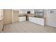 White kitchen cabinets and granite countertops at 1702 S Miller Rd, Valrico, FL 33594