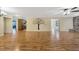 Hardwood floors throughout this open living room and dining area at 1702 S Miller Rd, Valrico, FL 33594