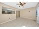 Open living room with a view into the kitchen at 1702 S Miller Rd, Valrico, FL 33594