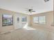 Bright living room with tile floors and neutral walls at 1702 S Miller Rd, Valrico, FL 33594