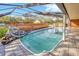 Rectangle pool with screened enclosure and deck at 1702 S Miller Rd, Valrico, FL 33594