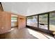 Screened porch with brick walls at 1702 S Miller Rd, Valrico, FL 33594