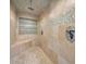 Large walk-in shower with tile surround at 1702 S Miller Rd, Valrico, FL 33594