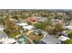 Beautiful aerial view of neighborhood with in-ground pool and a shed in the backyard at 1707 Darlington Dr, Tampa, FL 33619