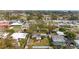 An aerial shot highlighting the home's backyard pergola and proximity to surrounding amenities at 1707 Darlington Dr, Tampa, FL 33619