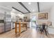 Modern kitchen featuring stainless steel appliances, sleek white cabinets, and a central island at 1707 Darlington Dr, Tampa, FL 33619