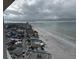 Aerial view of beachfront property, showing the beach and ocean at 17900 Gulf Blvd # 16C, Redington Shores, FL 33708