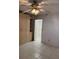 Bedroom with built-in wardrobe and ceiling fan at 17900 Gulf Blvd # 16C, Redington Shores, FL 33708