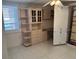 Bright bedroom with built-in desk and cabinets at 17900 Gulf Blvd # 16C, Redington Shores, FL 33708