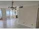 Spacious living room with ocean view and tiled floors at 17900 Gulf Blvd # 16C, Redington Shores, FL 33708