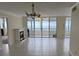 Spacious living room with ocean view and fireplace at 17900 Gulf Blvd # 16C, Redington Shores, FL 33708