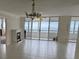 Living room boasts ocean view and fireplace at 17900 Gulf Blvd # 16C, Redington Shores, FL 33708