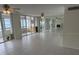 Living room with ocean views and tiled floors at 17900 Gulf Blvd # 16C, Redington Shores, FL 33708