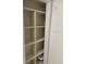 Well-organized pantry with adjustable shelving at 17900 Gulf Blvd # 16C, Redington Shores, FL 33708