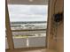 Stunning panoramic view of the water from a condo window at 17900 Gulf Blvd # 16C, Redington Shores, FL 33708