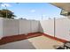 Private backyard with wood privacy fence at 1799 N Highland Ave # 99, Clearwater, FL 33755