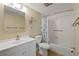 Bathroom with shower/tub combo and grab bars at 1799 N Highland Ave # 99, Clearwater, FL 33755