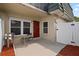 Private patio with seating area and privacy fence at 1799 N Highland Ave # 99, Clearwater, FL 33755