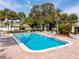 Inviting community pool with ample deck space for lounging at 1799 N Highland Ave # 99, Clearwater, FL 33755