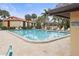 Inviting community swimming pool with plenty of lounge chairs at 1801 E Lake Rd # 15C, Palm Harbor, FL 34685