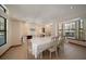 Bright dining room with view of the living room and kitchen at 18419 Tyler Rd, Odessa, FL 33556