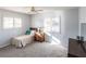 Cozy bedroom with window seating and ceiling fan at 18719 Van Nuys Cir, Port Charlotte, FL 33948