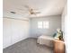 Bright bedroom with built-in closet and ceiling fan at 18719 Van Nuys Cir, Port Charlotte, FL 33948