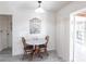 Charming breakfast nook with a round table and two chairs, perfect for small meals at 18719 Van Nuys Cir, Port Charlotte, FL 33948