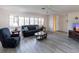 Spacious living room featuring a neutral color palette and modern flooring at 18719 Van Nuys Cir, Port Charlotte, FL 33948