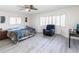 Spacious main bedroom with bay window and ceiling fan at 18719 Van Nuys Cir, Port Charlotte, FL 33948