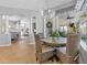 Bright dining area with a round table and wicker chairs at 26853 Winged Elm Dr, Wesley Chapel, FL 33544