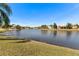 Scenic view of the lake and community homes at 26853 Winged Elm Dr, Wesley Chapel, FL 33544