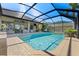 Enjoy this relaxing screened pool and patio area at 26853 Winged Elm Dr, Wesley Chapel, FL 33544