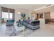 Modern living room with open kitchen and city views at 301 1St S St # 1404, St Petersburg, FL 33701