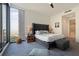 Main bedroom features a king-size bed and waterfront views at 301 1St S St # 1404, St Petersburg, FL 33701