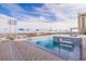 Resort-style pool with plenty of lounge chairs and a spa; beautiful views at 301 1St S St # 1404, St Petersburg, FL 33701