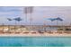 Scenic pool deck overlooking marina; lounge chairs and umbrellas provided at 301 1St S St # 1404, St Petersburg, FL 33701