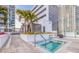 Relaxing spa with hot tub and seating area, surrounded by tropical landscaping at 301 1St S St # 1404, St Petersburg, FL 33701