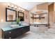 Bathroom boasts a double vanity and a corner jacuzzi tub at 3312 Cobbs Ct, Palm Harbor, FL 34684