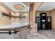 Spa-like bathroom featuring a large corner tub and modern fixtures at 3312 Cobbs Ct, Palm Harbor, FL 34684