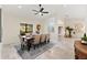 Spacious dining room with a large wooden table and six chairs at 3312 Cobbs Ct, Palm Harbor, FL 34684